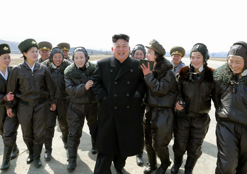 Illustration for article titled Kim Jong Un Visits Female Fighter Pilots, Picks Up Camera For Photo Op